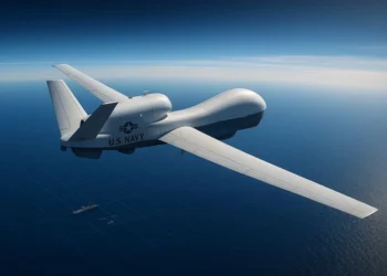 US Navy MQ-4C Triton drone flying high altitude surveillance mission over the ocean